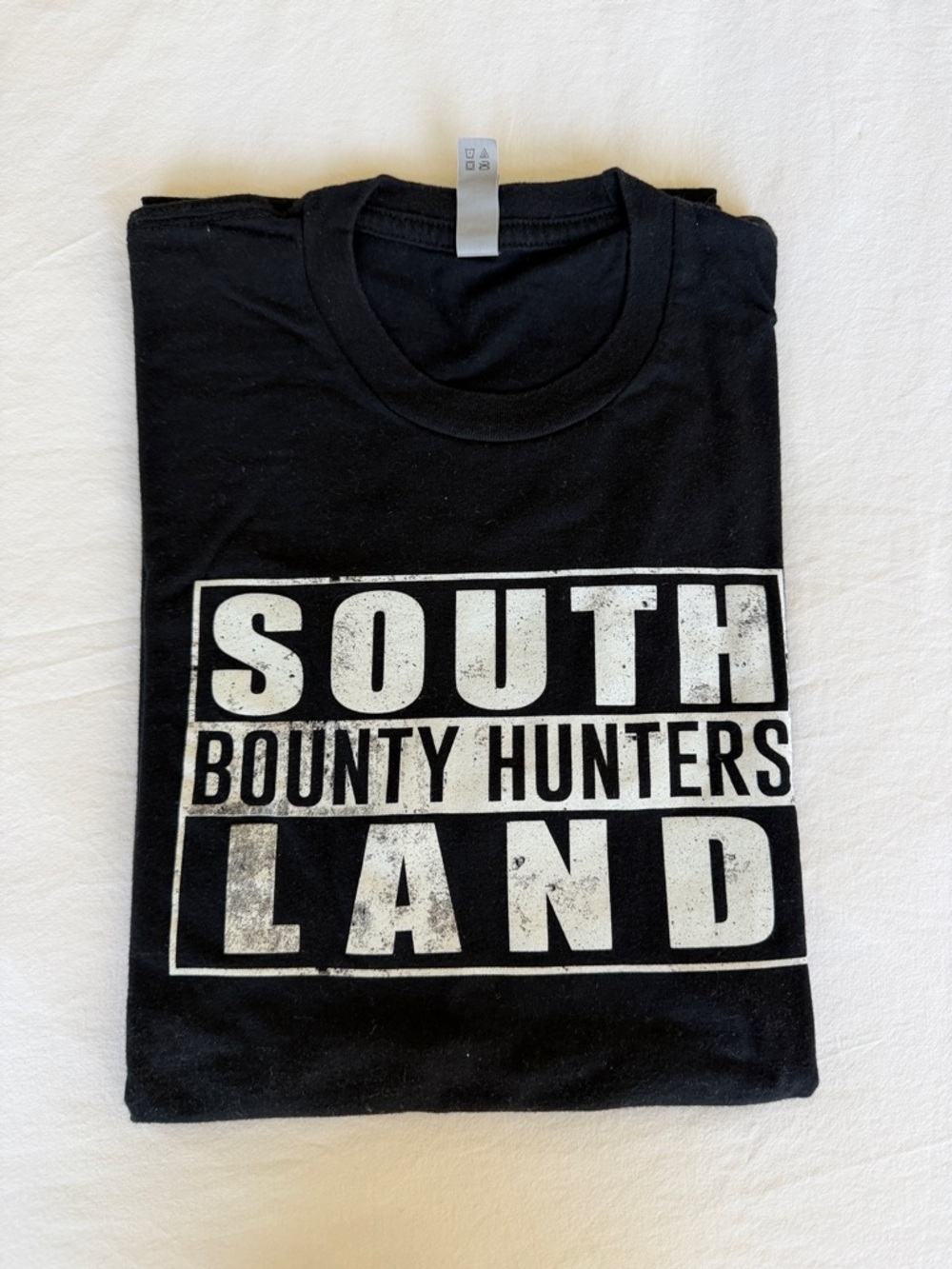 Black 'South Bounty Hunters Land' Graphic Tee (Patty Mayo)